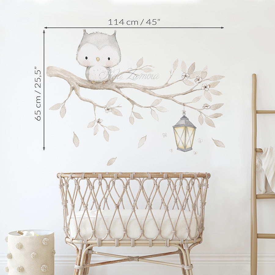 Size guide showing 45 inches by 25.5 inches dimensions for watercolor owl on a branch fabric wall decal above a rattan crib